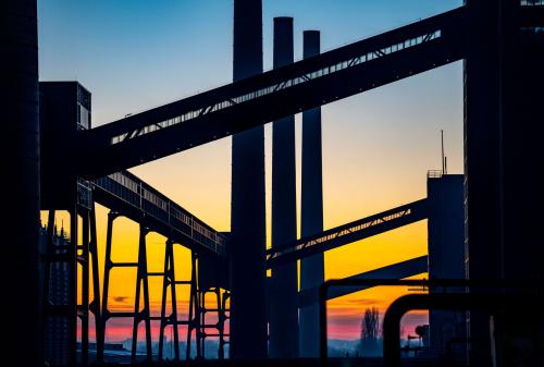 Coking Plant, chimneys and band bridges in the evening light, Essen, Germany.